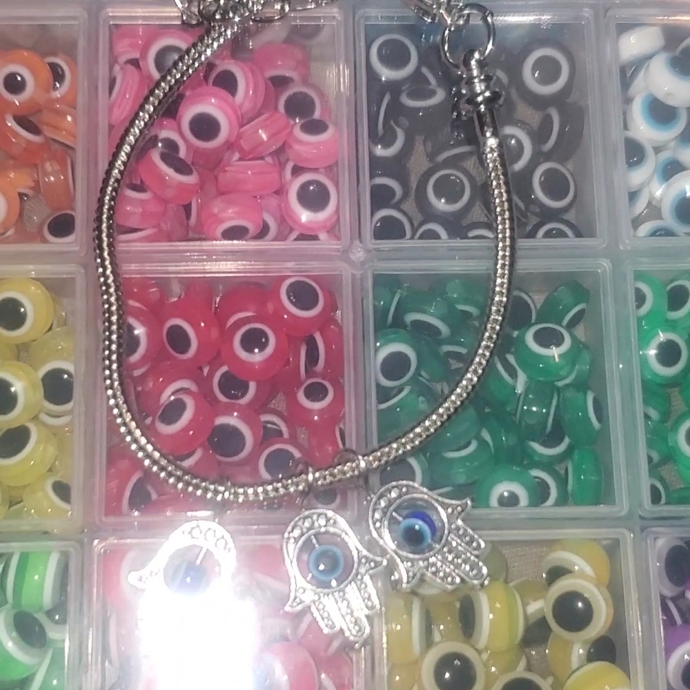 Silver Hamsa Hand Bracelet with Blue Eye Charms